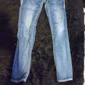 Rock revival women's light wash boot cut jeans.